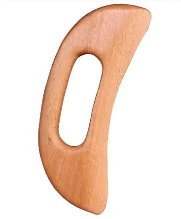 Beech wood gua sha tool on white background